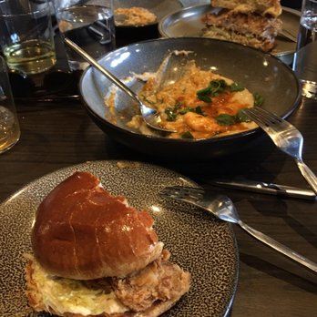 Roister - Grits and chicken sandwich. Both were phenomenal. - New American Near Me - Chicago, Illinois Roister - Grits and chicken sandwich. Both were phenomenal. - New American Near Me - Chicago, Illinois