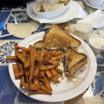 BBD2 Diner - Steak sandwich with Sweet Potato Fries. In the back BBD2 Bowl with a side of Biscuits & Housemade Gravy - Half Order - Breakfast & Brunch Near Me - Tulsa, Oklahoma