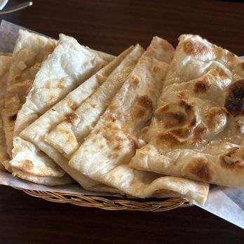 Aangan Indian Cuisine - 2x Plain naan ($2.50 each) - Indian Near Me - Burnaby, British Columbia Aangan Indian Cuisine - 2x Plain naan ($2.50 each) - Indian Near Me - Burnaby, British Columbia