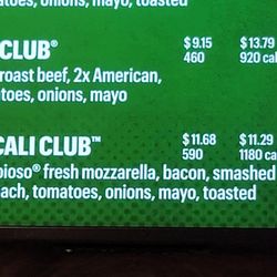 Menu listed on billboard above register.