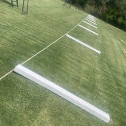 Aggieland Driving Range - Close-up photo of tee boxes