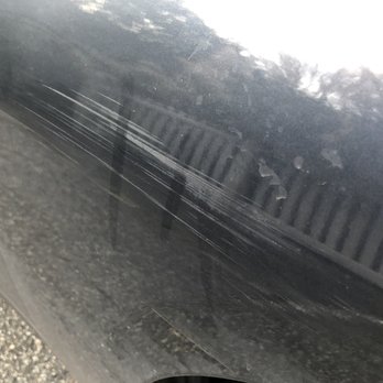 Amtrak Autotrain - Damage caused by Amtrak.  The location and nature of the scrapes were blatantly caused by hitting car against side of train car. - Train Stations Near Me - Lorton, Virginia