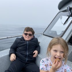 Crescent City Fishing Charters - Our kiddos relaxing on the boat headed to get some fishies!