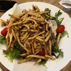 Forester Resturant and Tavern - Steak salad under the fries