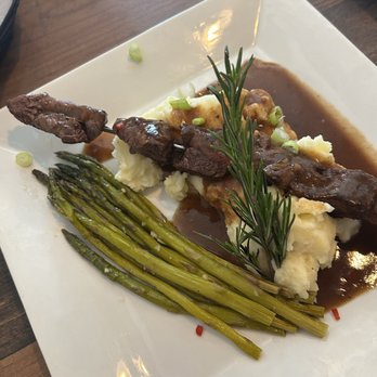 Jack’s On Main - Filet mignon tips with asparagus and mashed potatoes. - Tapas/Small Plates Near Me - Clayton, Delaware Jack’s On Main - Filet mignon tips with asparagus and mashed potatoes. - Tapas/Small Plates Near Me - Clayton, Delaware