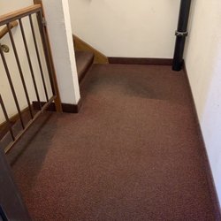 Thomas Lake Pointe Apartments - Carpet stains in central stairwell, 1510 building.  That's not a shadow.
