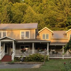 Whiteface Farm Adirondack Bed & Breakfast - Morning sunlight on the house in summer.