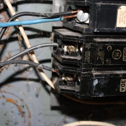 Kennedy Inspections - Double tapped breaker and undersized AC wiring