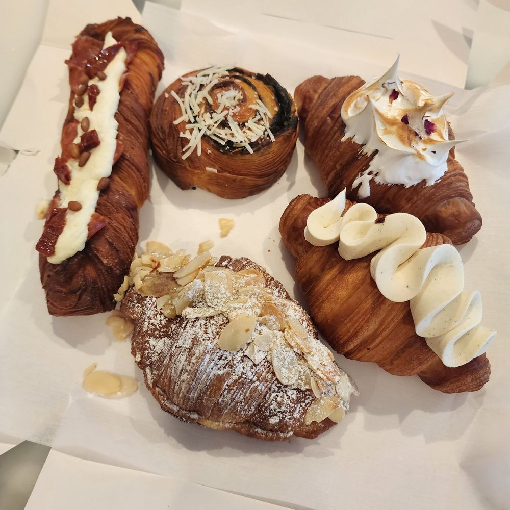 a variety of pastries in a box a variety of pastries in a box