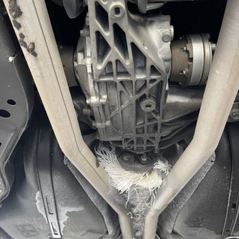 Orange Auto Center - This tarp was entrapped on my driveshaft, restricting my car from shifting gears. - Auto Repair Near Me - Orange, California