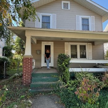 Michael Bishop - Howard Hanna - A happy new home owner in front of her new place. September 2024 - Real Estate Agents Near Me - New Albany, Ohio Michael Bishop - Howard Hanna - A happy new home owner in front of her new place. September 2024 - Real Estate Agents Near Me - New Albany, Ohio