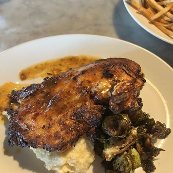 The Standard Restaurant - Brick chicken with brussel sprouts instead of collard greens - American Near Me - Toledo, Ohio
