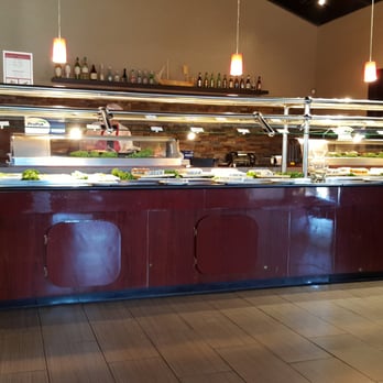 Wok & Roll - They have a great sushi bar with two guys back there constantly putting out dishes. - Japanese Near Me - Tucson, Arizona Wok & Roll - They have a great sushi bar with two guys back there constantly putting out dishes. - Japanese Near Me - Tucson, Arizona