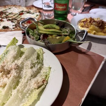 Ribalta - caesar salad and avocado salad and carbonara in the background - Pizza Near Me - New York, New York Ribalta - caesar salad and avocado salad and carbonara in the background - Pizza Near Me - New York, New York