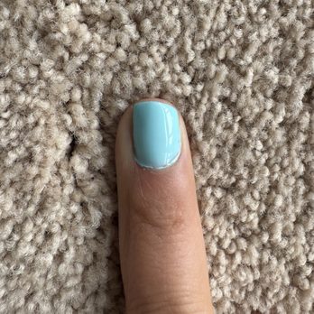 Olivia Nail Bar - Left middle nail (not cut straight) - Nail Salons Near Me - Moraga, California
