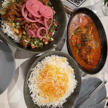 Maydoon - Maydoon Bowl on the left and Lamb Shank on the right served with rice - Persian/Iranian Near Me - Sacramento, California Maydoon - Maydoon Bowl on the left and Lamb Shank on the right served with rice - Persian/Iranian Near Me - Sacramento, California