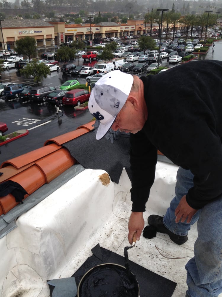 Slide of Hector's Roofing