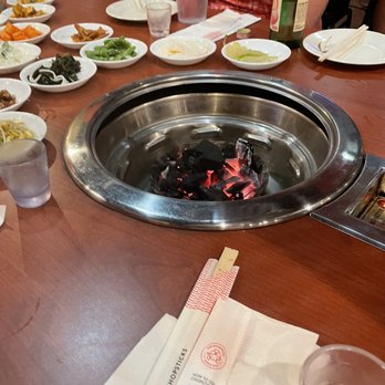 Bando Korean Restaurant - Starting up the coals to grill the meat - Korean Near Me - Indianapolis, Indiana Bando Korean Restaurant - Starting up the coals to grill the meat - Korean Near Me - Indianapolis, Indiana