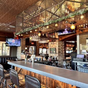 Taverna Rossa - a bar with a large screen tv - Pizza Near Me - Plano, Texas Taverna Rossa - a bar with a large screen tv - Pizza Near Me - Plano, Texas