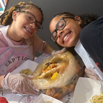 Cap't Loui - Kids loving their Pick 3 Seafood Combo - Cajun/Creole Near Me - Providence, Rhode Island