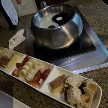 The Melting Pot - The yin Yang chocolate dessert is the only choice - it remakes rice crispy treats. - Fondue Near Me - Melbourne, Florida