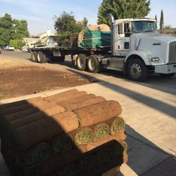 Utterback Sod Farm - 1 roll = 10 sq feet.  10 rolls of sod in each layer meaning 100 sq per layer.  5 layers in a pallets so 500 sq feet on a pallet.