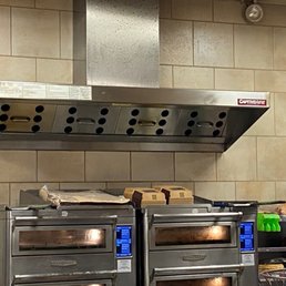 ovens in a commercial kitchen ovens in a commercial kitchen