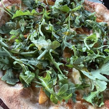 Watershed - PEACH PIE - $24 - yellow peach, pancetta, mozzarella, pt reyes blue, honey, arugula. - New American Near Me - Mill Valley, California