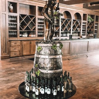 Tunnel Creek Vineyards - a statue of a boy holding a barrel of wine - Venues & Event Spaces Near Me - Roxboro, North Carolina Tunnel Creek Vineyards - a statue of a boy holding a barrel of wine - Venues & Event Spaces Near Me - Roxboro, North Carolina
