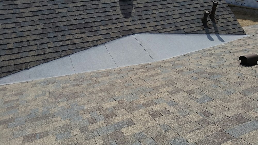 Slide of Novotny Roofing Inc