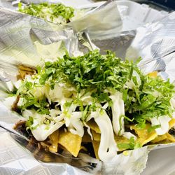 Tacos El Takin - Chilaquiles w/ green tomatillo sauce