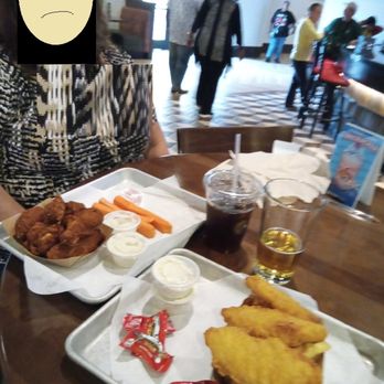 Soboba Pub & Grill - a woman sitting at a table with food - Burgers Near Me - San Jacinto, California Soboba Pub & Grill - a woman sitting at a table with food - Burgers Near Me - San Jacinto, California