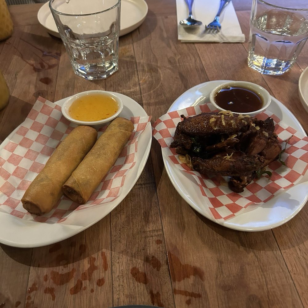 Pai Northern Thai Kitchen - Spring rolls (comes in 3's) and Thai chicken wings - Thai Near Me - Toronto, Ontario Pai Northern Thai Kitchen - Spring rolls (comes in 3's) and Thai chicken wings - Thai Near Me - Toronto, Ontario
