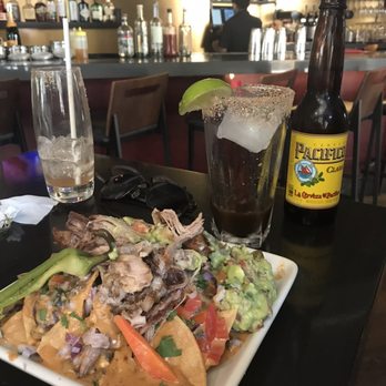 Mercado - Pasadena - Carnitas nachos after I started tearing into them!! - Mexican Near Me - Pasadena, California Mercado - Pasadena - Carnitas nachos after I started tearing into them!! - Mexican Near Me - Pasadena, California