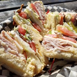 The Boss Hawg: Ham, turkey, bacon, tomato, Swiss cheese & mayo