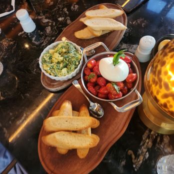 Fogo de Chão - Burrata Tomato and warm spinach Artichoke dip - Steakhouses Near Me - New York, New York Fogo de Chão - Burrata Tomato and warm spinach Artichoke dip - Steakhouses Near Me - New York, New York