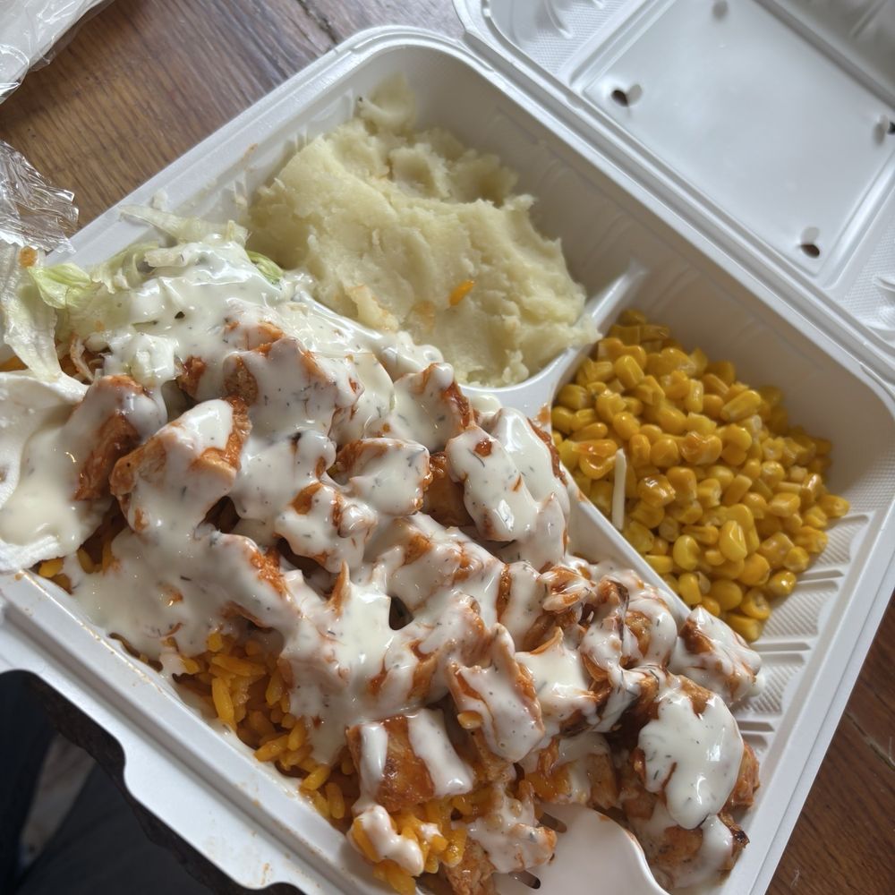 NonStop Chicken - Chicken and rice platter with white sauce, buffalo sauce, mash potatoes, and corn - Burgers Near Me - Clifton, New Jersey NonStop Chicken - Chicken and rice platter with white sauce, buffalo sauce, mash potatoes, and corn - Burgers Near Me - Clifton, New Jersey