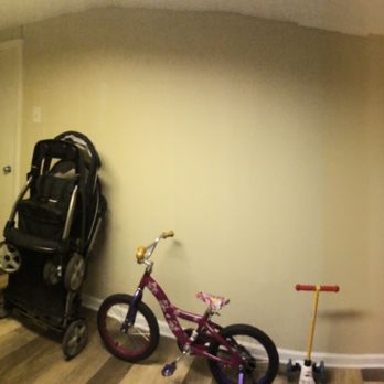 Jack H Sullivan, JR General Contractor - a hallway with a bicycle and a backpack - Roofing Near Me - Colonial Heights, Virginia Jack H Sullivan, JR General Contractor - a hallway with a bicycle and a backpack - Roofing Near Me - Colonial Heights, Virginia