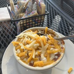 Chili with complimentary cheese and onions Chili with complimentary cheese and onions