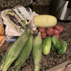 Savory Farmers Market - Variety of Purple,Yellow and Green Beans, Spaghetti Squash, Red Potatoes, Cucumbers, and Corn on the Cob.