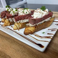 Water Tower Grille and Smokehouse - Prime rib on a crusty bread! Loved it!