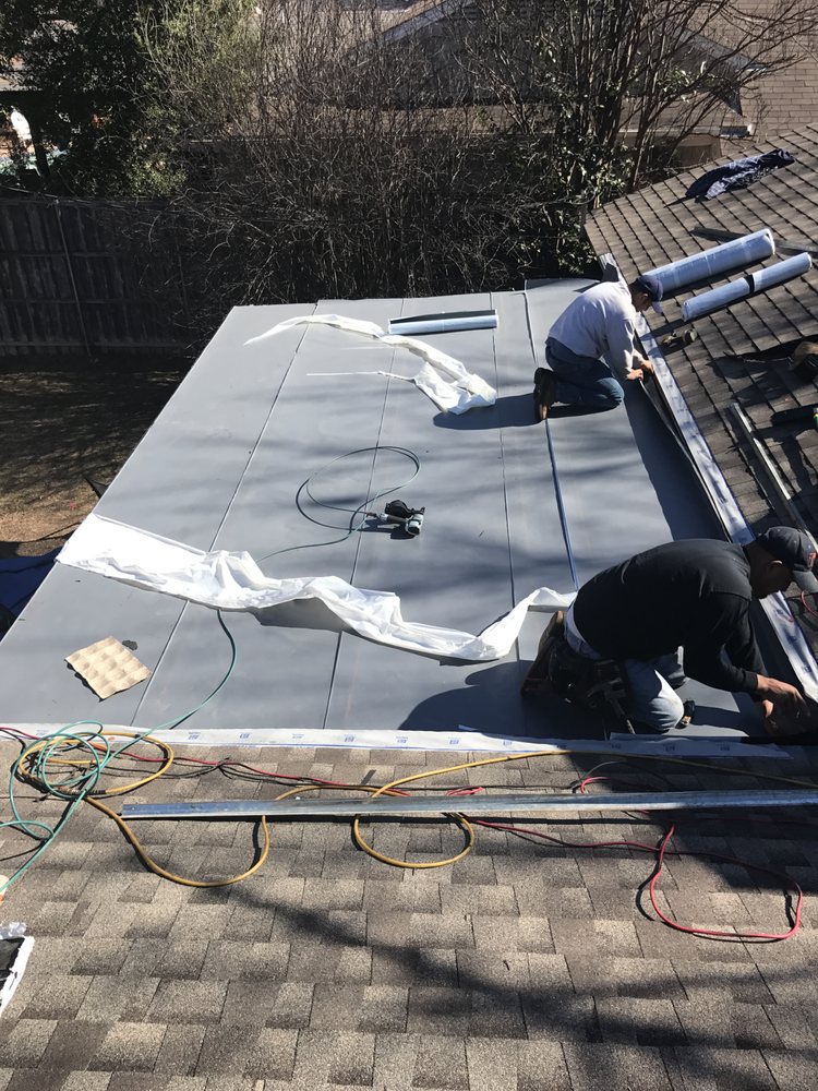 Slide of Ojeda's Restoration & Roofing