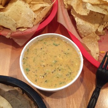 Torchy's Tacos - Chips and green queso. Spicy but delicious. - Tex-Mex Near Me - Houston, Texas