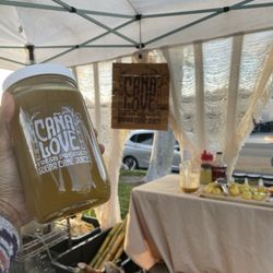 Cana Love - Fresh Pressed Caña Love juice by the tent!!