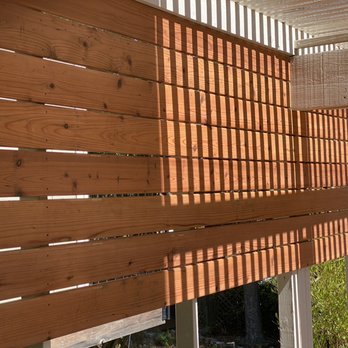 Intuitive Landscape & Construction - Back deck. Privacy wall. - Landscaping Near Me