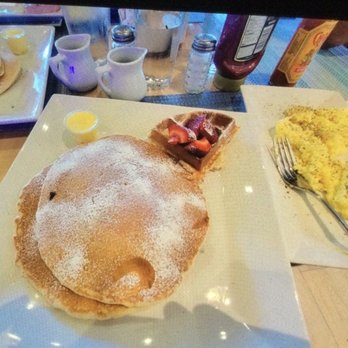 The Good Egg - Short stack, scrambled eggs, a quarter of Belgium waffle with whipped cream and fresh fruit. - Breakfast & Brunch Near Me - San Diego, California The Good Egg - Short stack, scrambled eggs, a quarter of Belgium waffle with whipped cream and fresh fruit. - Breakfast & Brunch Near Me - San Diego, California