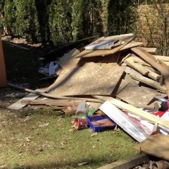 CMW Building Concepts - HUGE Pile of trash and debris left behind!!! - Handyman Near Me