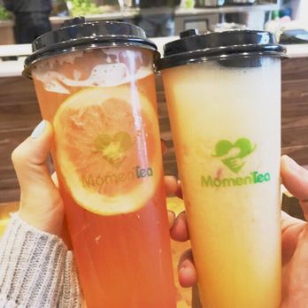 Momen Tea - Grapefruit green tea on left, peach green tea on right - Poke Near Me - New York, New York Momen Tea - Grapefruit green tea on left, peach green tea on right - Poke Near Me - New York, New York