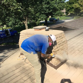SirVent Lexington - Chimney technician repairing a chimney. - Chimney Sweeps Near Me SirVent Lexington - Chimney technician repairing a chimney. - Chimney Sweeps Near Me