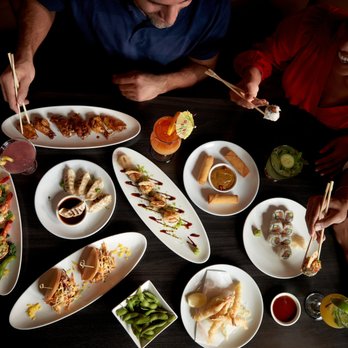 Benihana - a group of people enjoying a meal - Sushi Bars Near Me - Irving, Texas